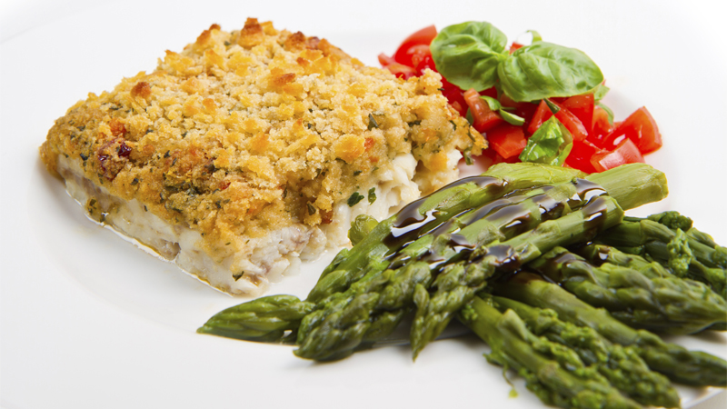 cod fish with crispy breadcrumbs and asparagus